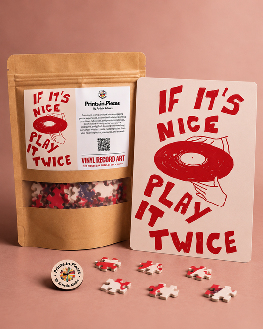 If It's Nice Play It Twice jigsaw puzzle – hand holding vinyl record in red and blush
