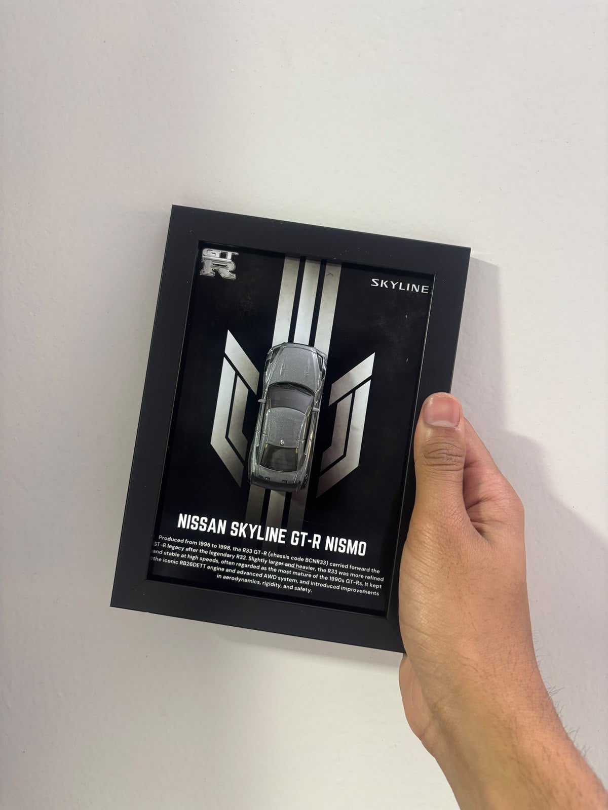 Nissan Skyline GT-R Nismo R33 diecast shadow box frame, view 3