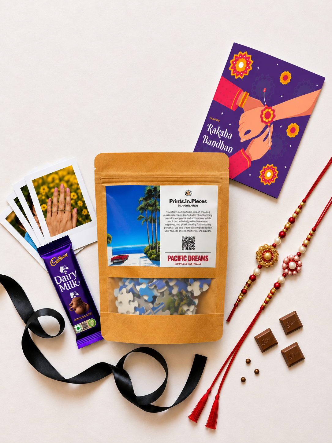 Iconic Artwork Puzzle Rakhi Hamper